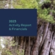A man in a red jacket stands in front of a massive old-growth western redcedar. A navy blue text box sits in the top left corner reading, "Ancient Forest Alliance; 2023 Activity Report & Financials". Ancient Forest Alliance's logo sits in the bottom right corner.